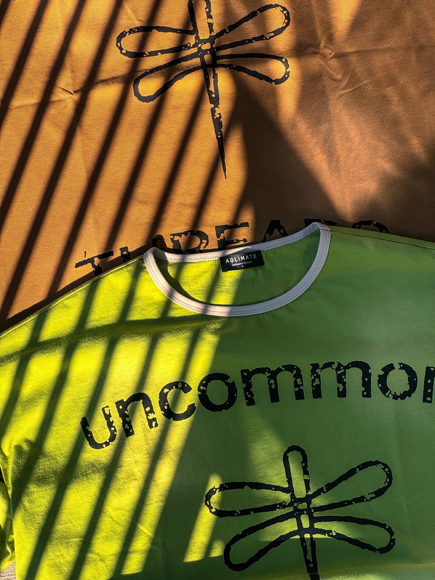 ‘Uncommon Threads’ Tee